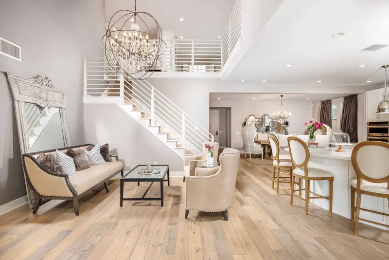 Two-story entry with orb chandelier and curved staircase — Aliso Viejo real estate photography
