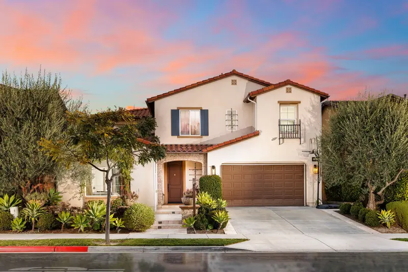 Two-story custom home exterior at dusk — Aliso Viejo real estate photography