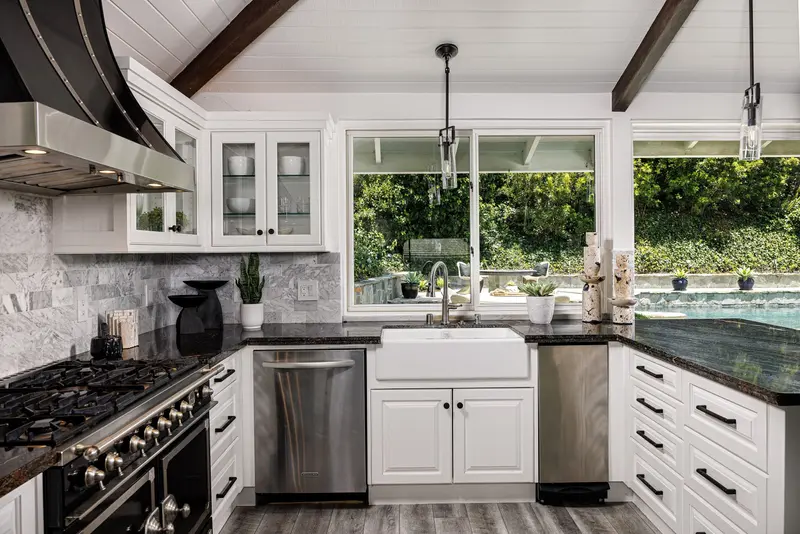 Kitchen range with marble backsplash — Corona del Mar real estate photography