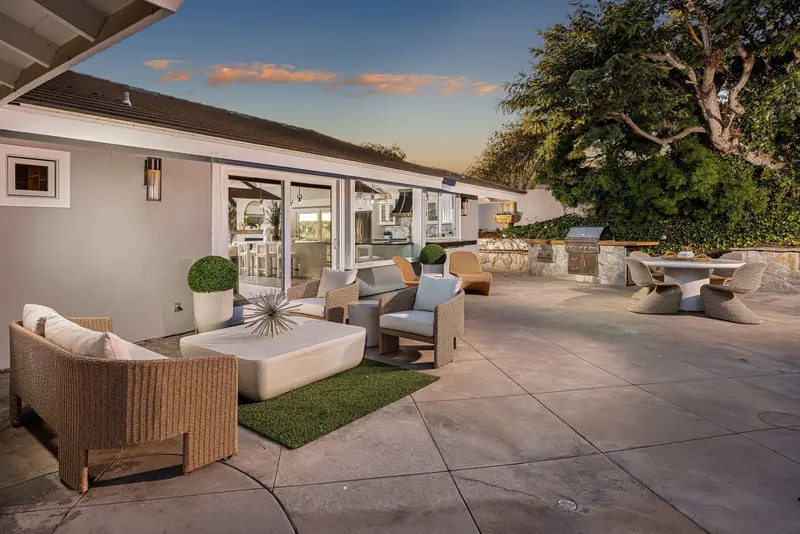 Patio lounge seating at dusk — Corona del Mar real estate photography