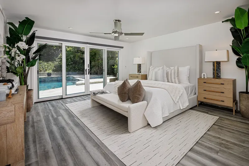 Primary bedroom opening to the pool — Corona del Mar real estate photography