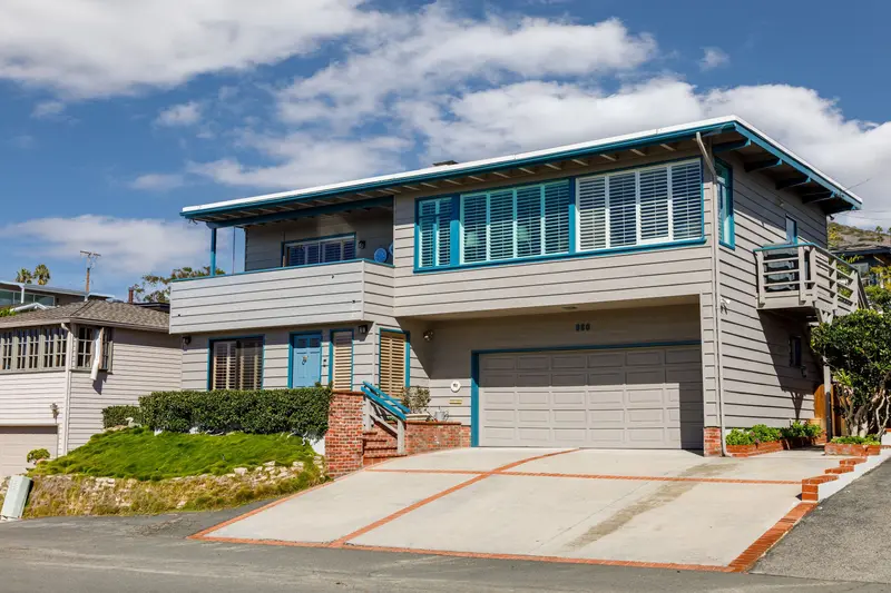 Cape Cod cottage exterior with blue trim — Laguna Beach real estate photography