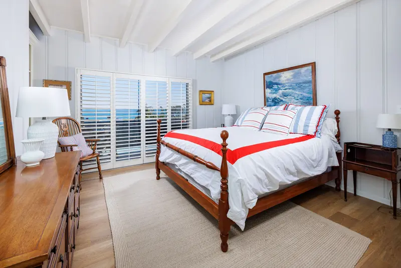Primary bedroom with nautical decor — Laguna Beach real estate photography