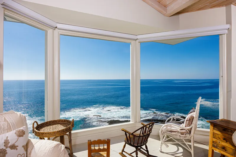 Sunroom with wraparound ocean views — Laguna Beach real estate photography