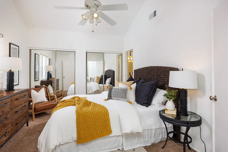 Primary bedroom with woven headboard — Lake Forest real estate photography