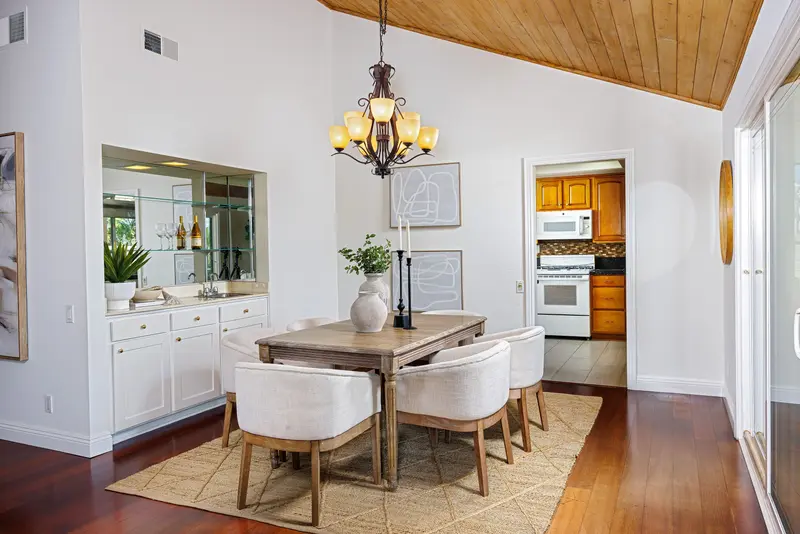 Dining room under a vaulted wood ceiling — Mission Viejo real estate photography