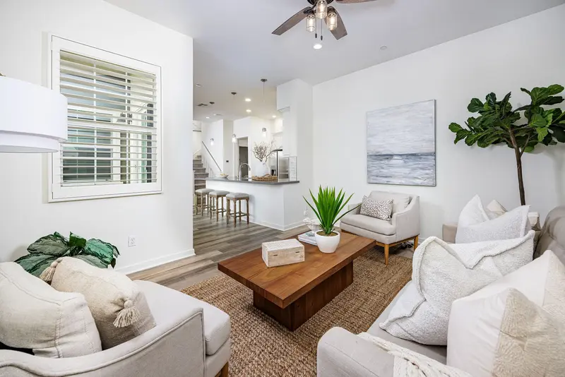 Living room open to the kitchen and stairwell — Rancho Mission Viejo real estate photography