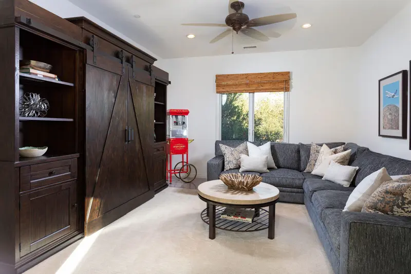Bonus room with barn-door media cabinet — San Clemente real estate photography