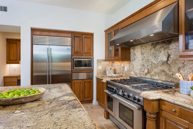 Kitchen range and granite backsplash detail — San Clemente real estate photography