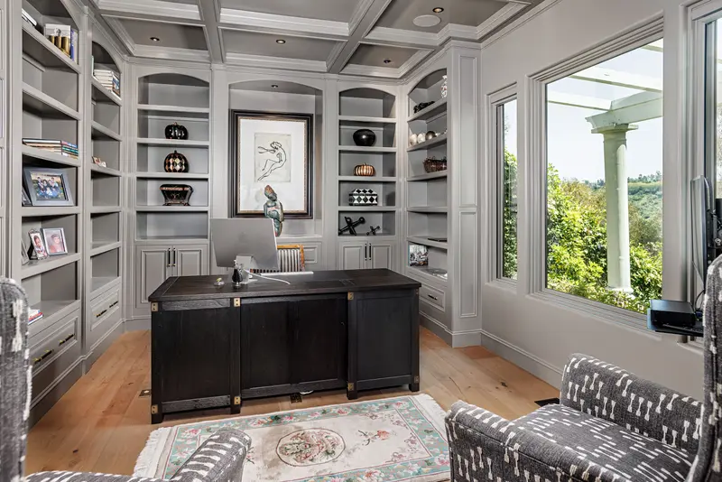 Home office with built-in bookshelves — San Juan Capistrano real estate photography