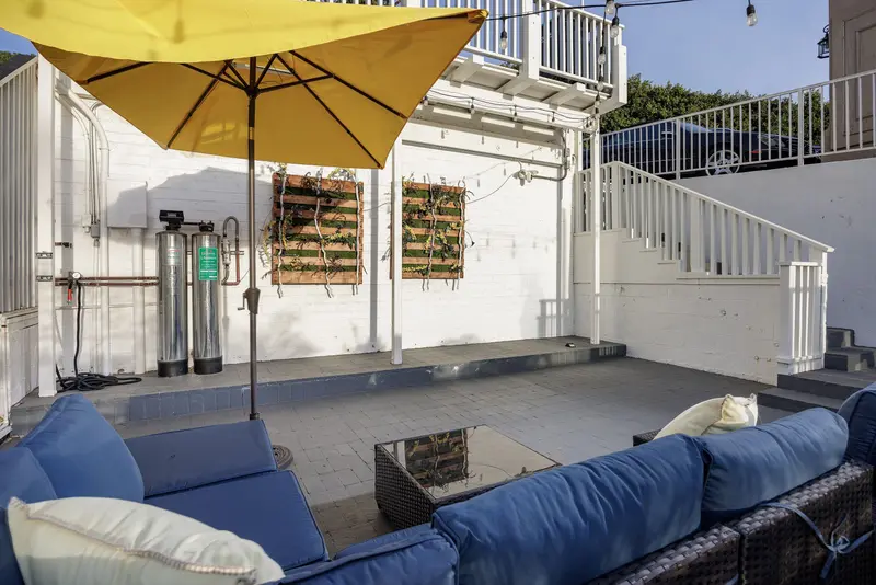 Rooftop deck with fire table at sunset — Laguna Beach real estate photography