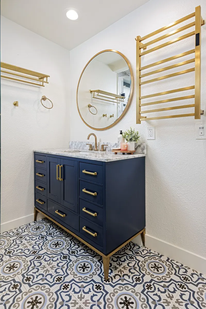 Bathroom vanity with brass fixtures — Laguna Beach real estate photography
